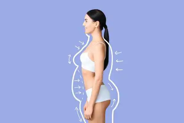 image of woman experiencing fat reduction treatment Leighton Buzzard
