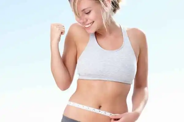 woman happy after fat reduction treatment Leighton Buzzard