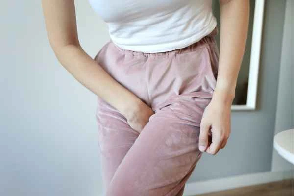 older woman running to the toilet because of urinary incontinence Leighton Buzzard