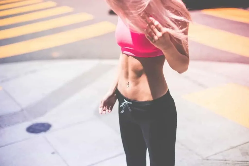 Woman with toned stomach after LA-EMS Body Sculpting Treatment Leighton Buzzard